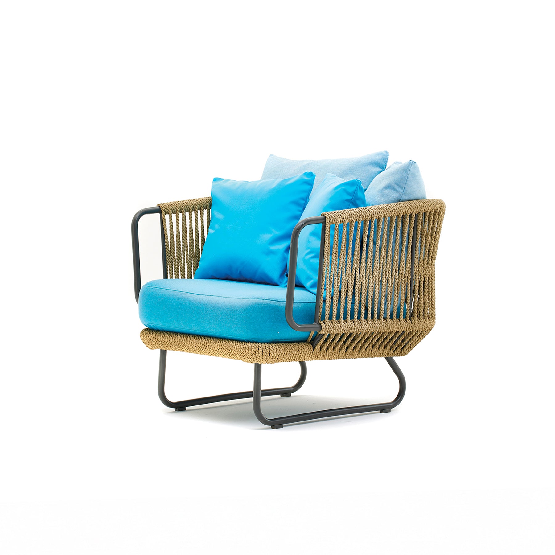 Wicker chair with blue cushions on a white background