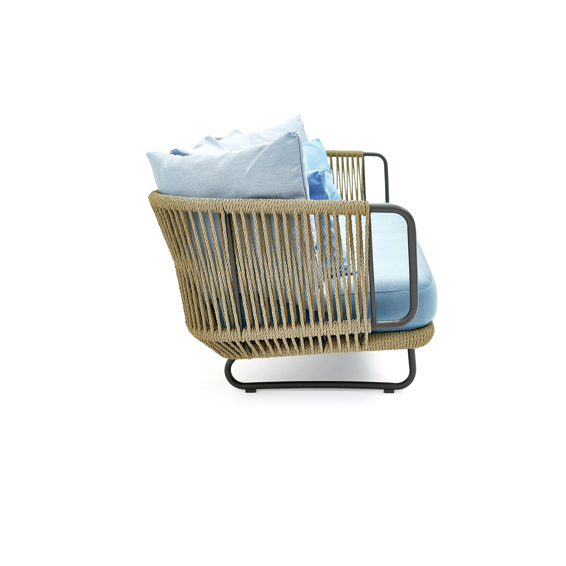 Wicker chair with blue cushion on a white background