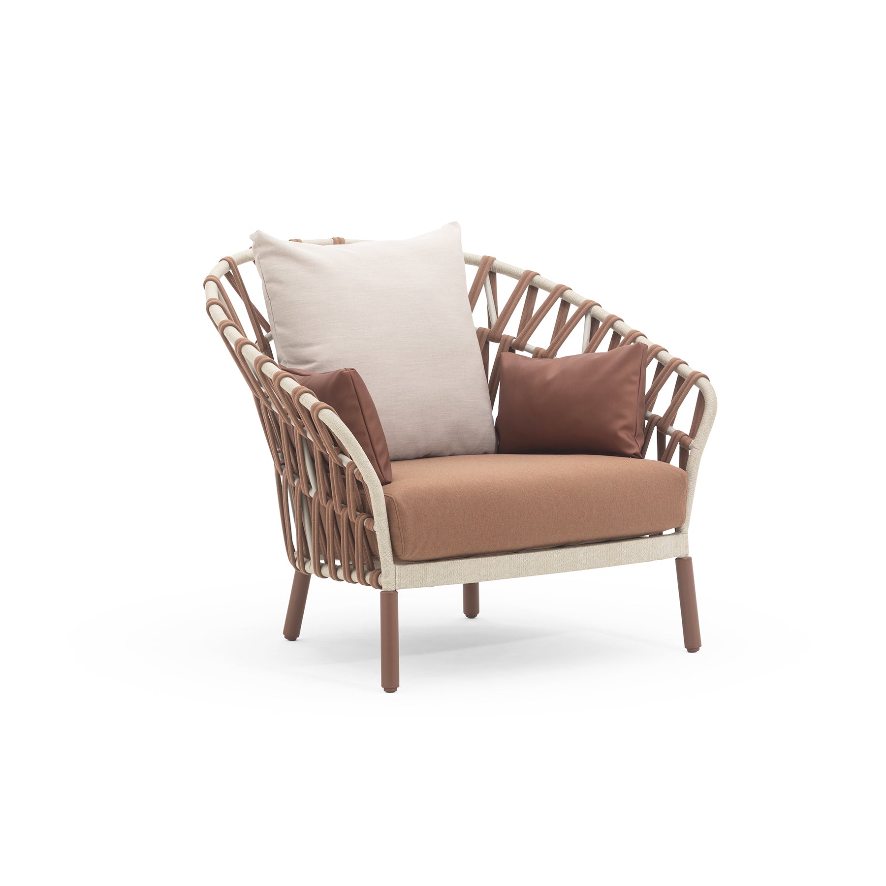 Wicker chair with brown cushions and a white pillow on a white background