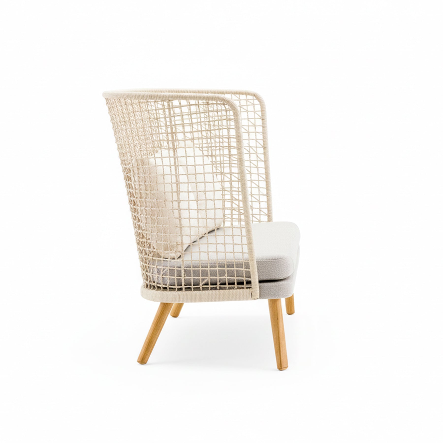 Wicker chair with a cushion on a white background