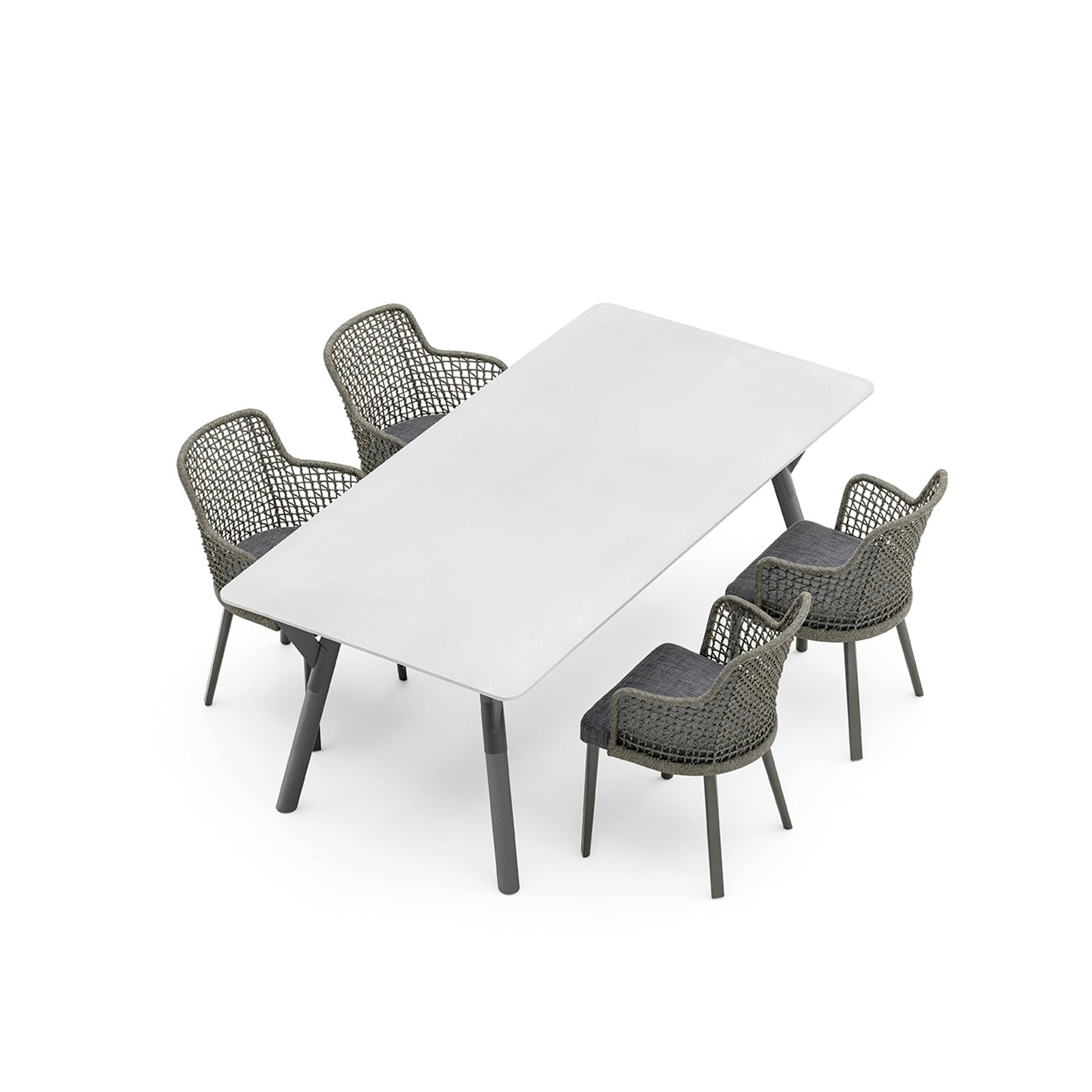 EMMA_extendabl White rectangular table with four dark gray wicker chairs on a white background