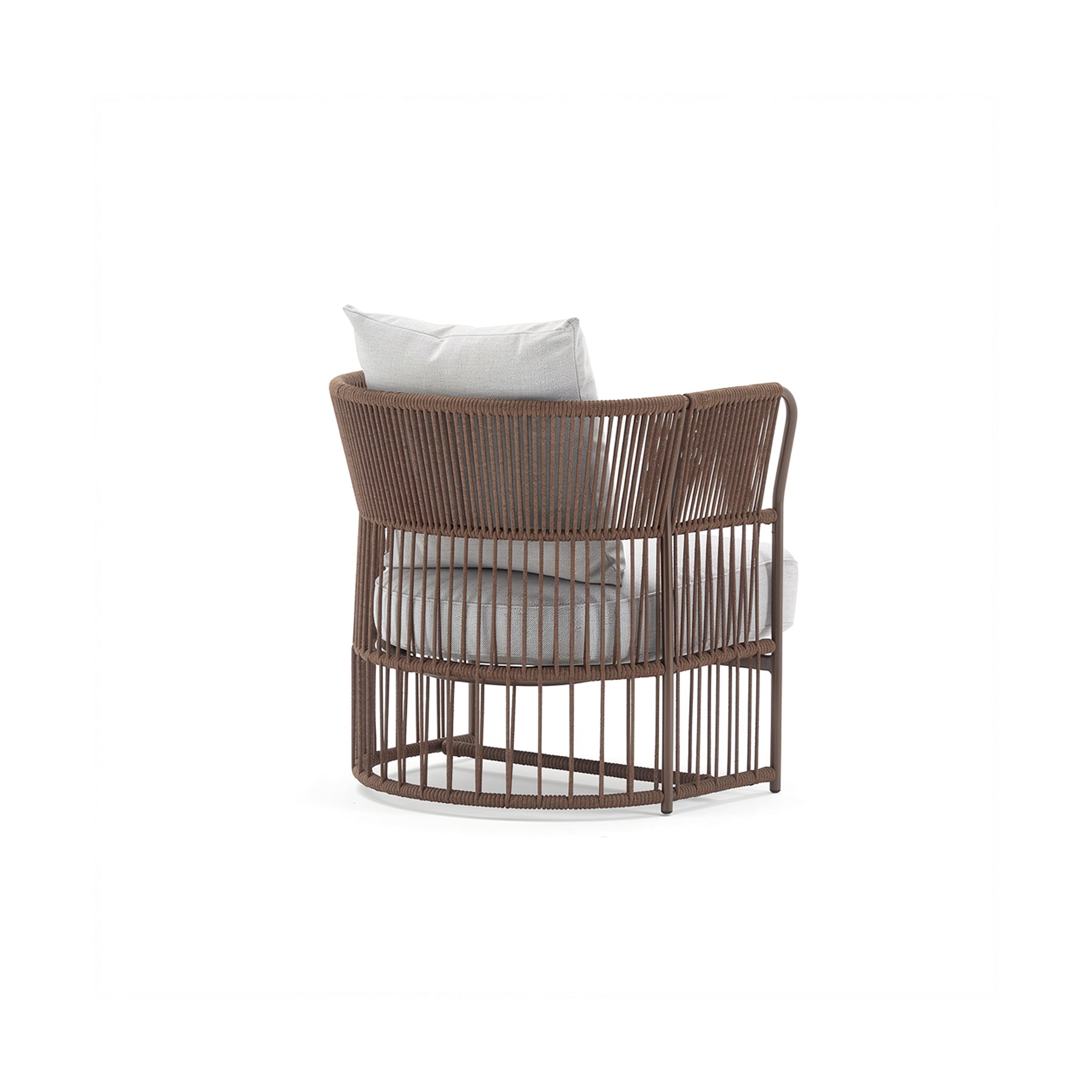 Wicker chair with a white cushion on a white background