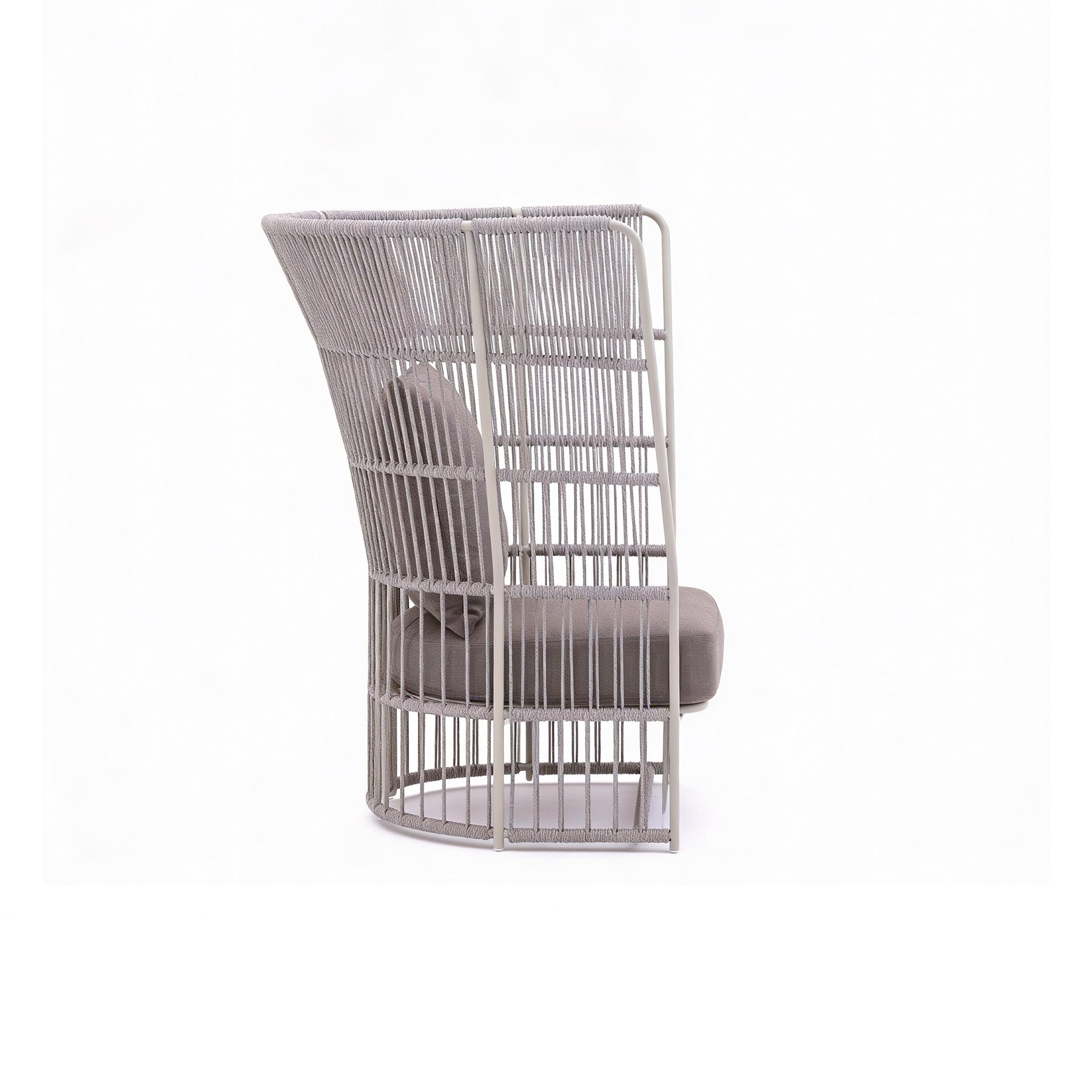 Modern chair with wicker frame and cushion on a white background