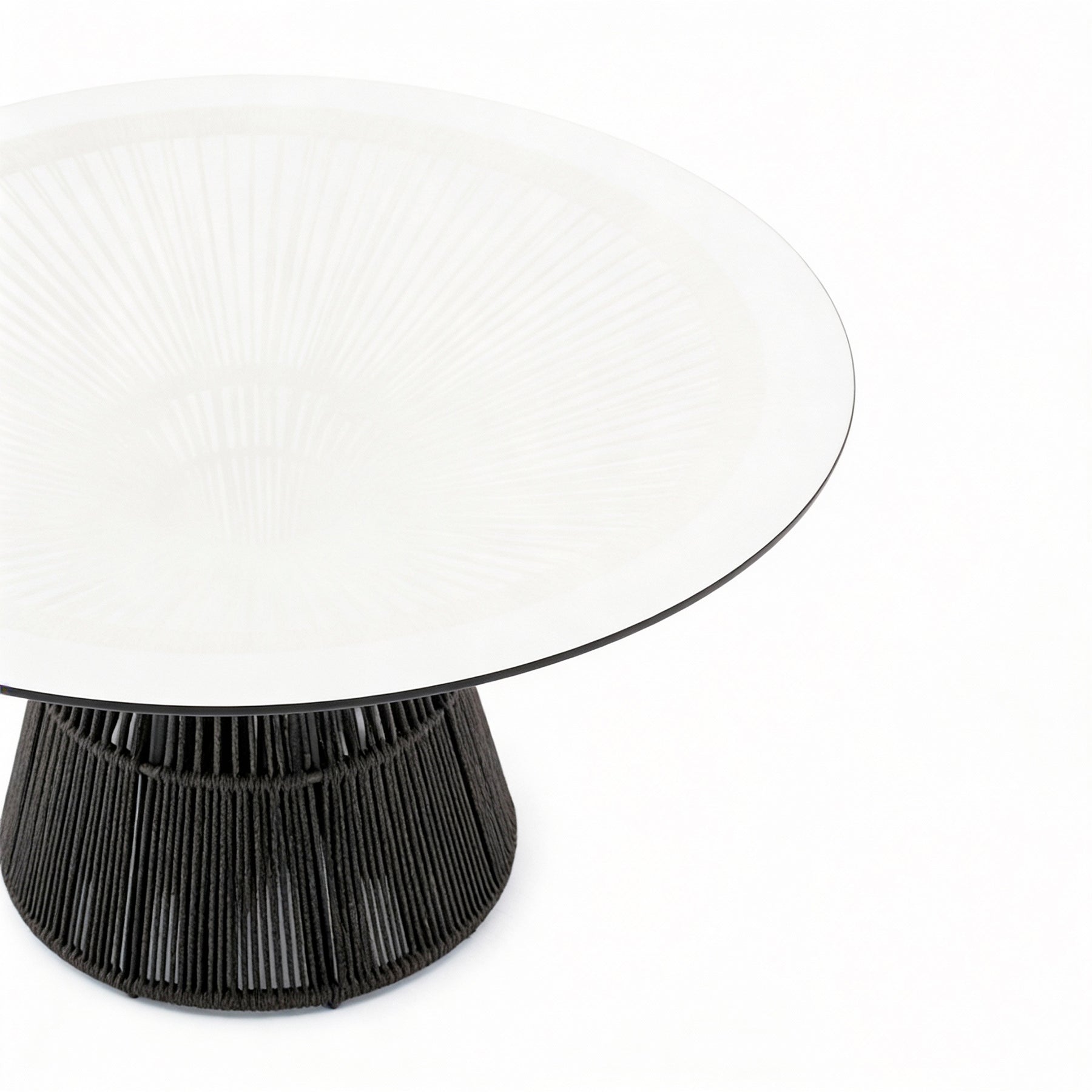 Round table with white top and black base on a white background
