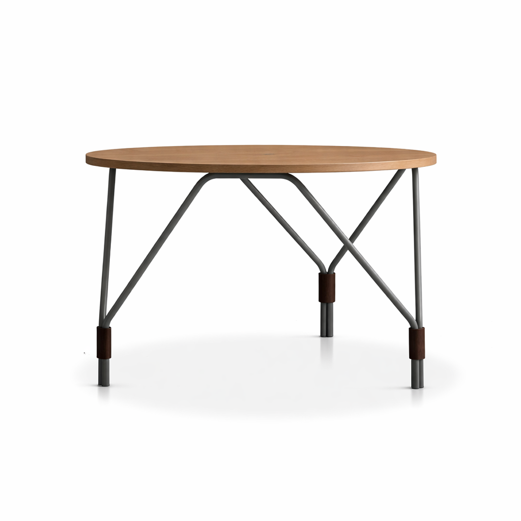 Round wooden table with metal legs on a white background