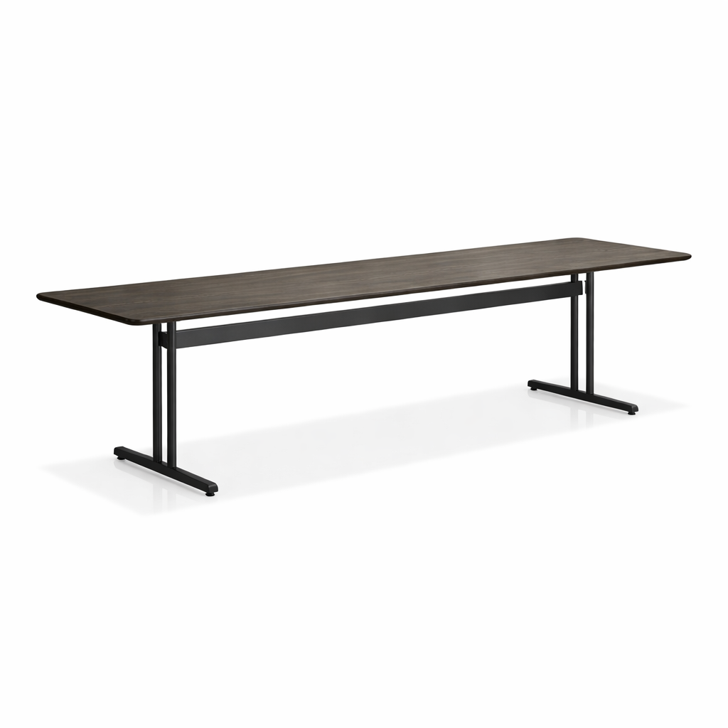 Long wooden table with black metal legs on a white background