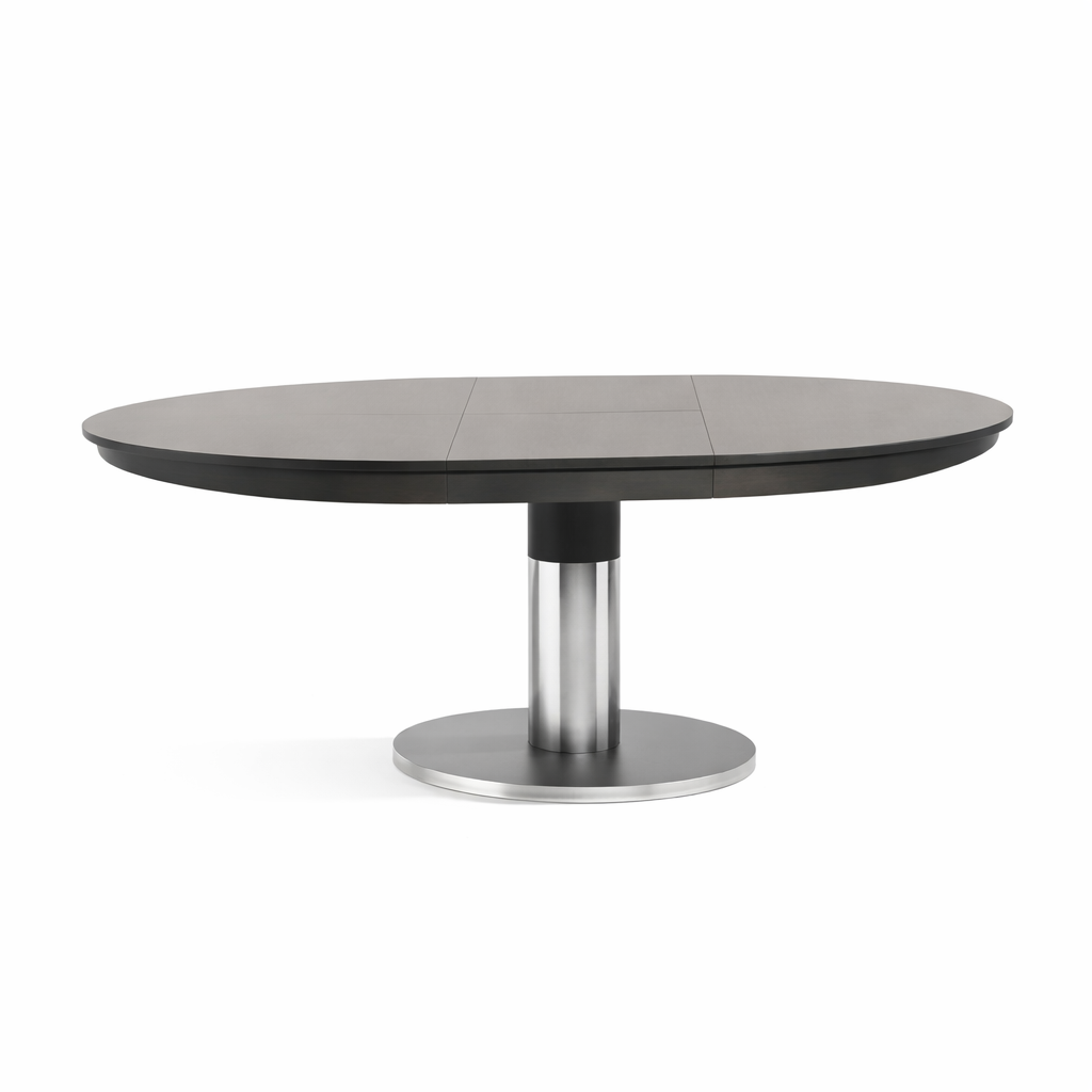 Round dining table with a dark surface and metal pedestal base on a white background