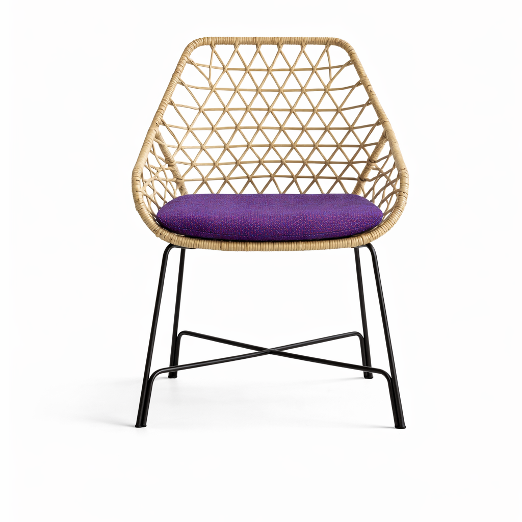 Woven chair with a purple cushion on a white background