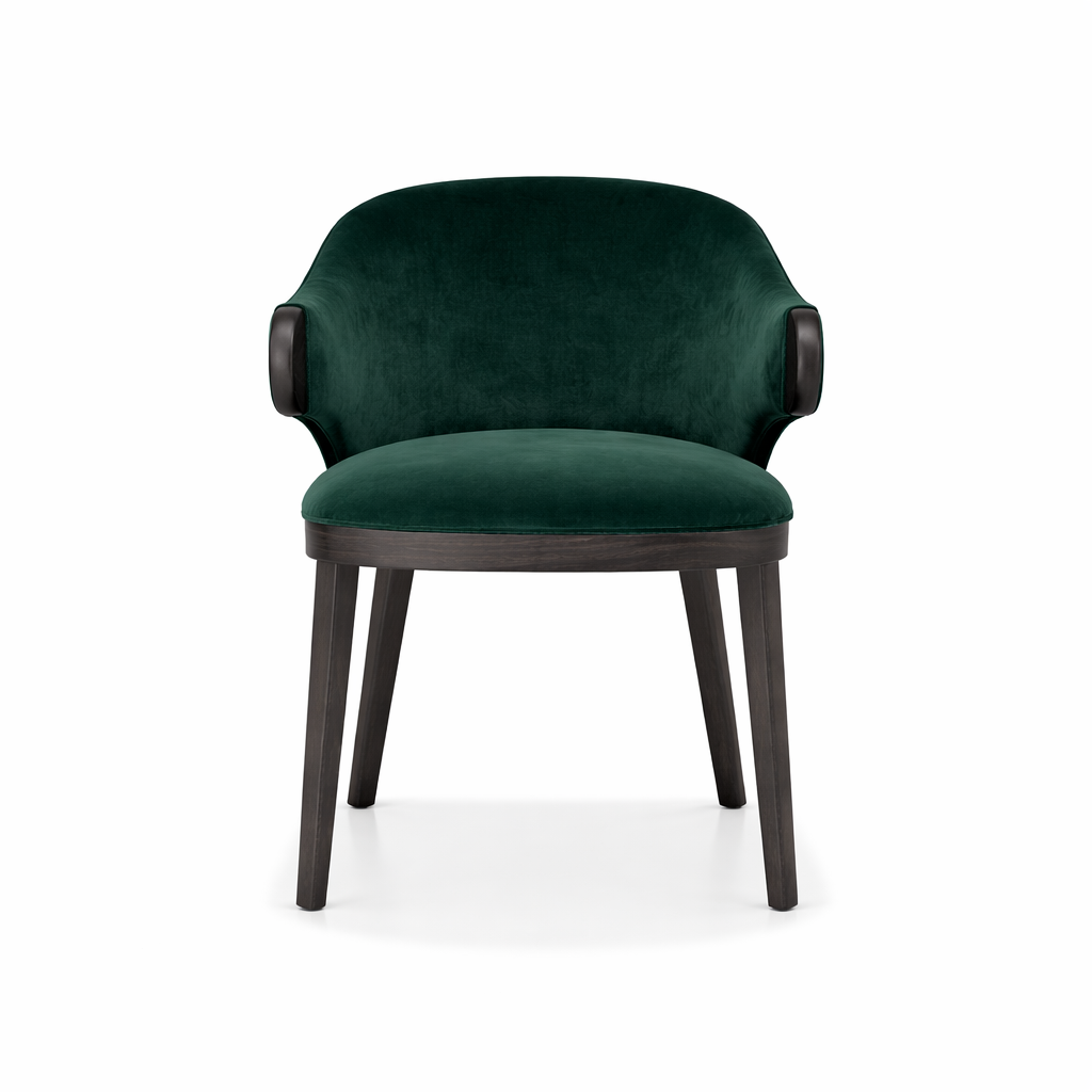 Green velvet armchair with dark wood legs on a white background