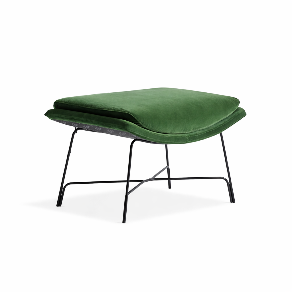 Green cushioned chair with black metal legs on a white background