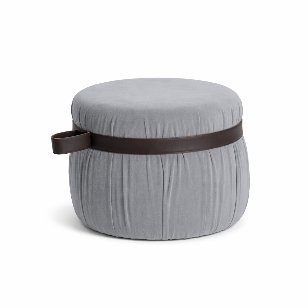Round gray ottoman with a brown band on a white background