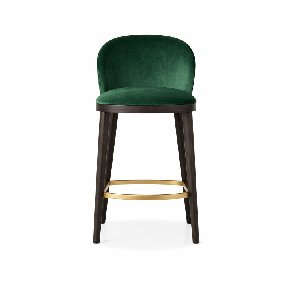 Green velvet bar stool with wooden legs and gold accent on a white background