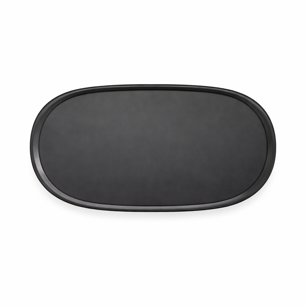 Black oval tray on a white background