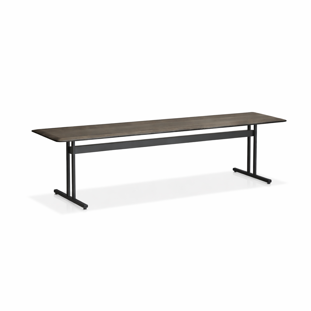 Long wooden table with black metal legs on a white background