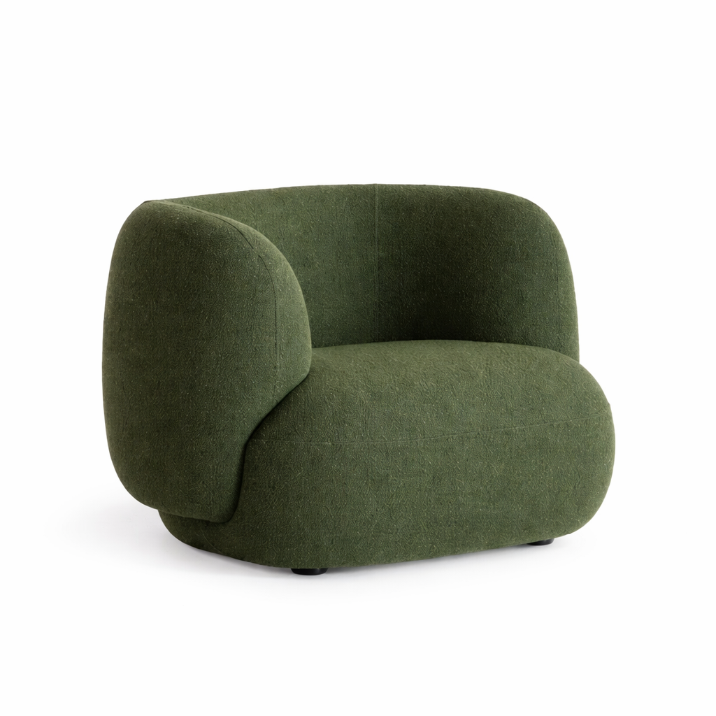 Green armchair on a white background