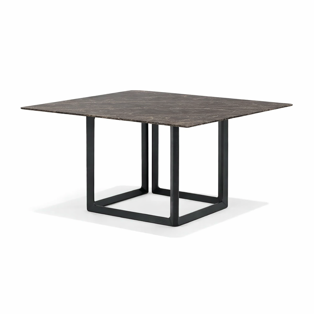 Square table with dark gray top and black metal legs on a white background