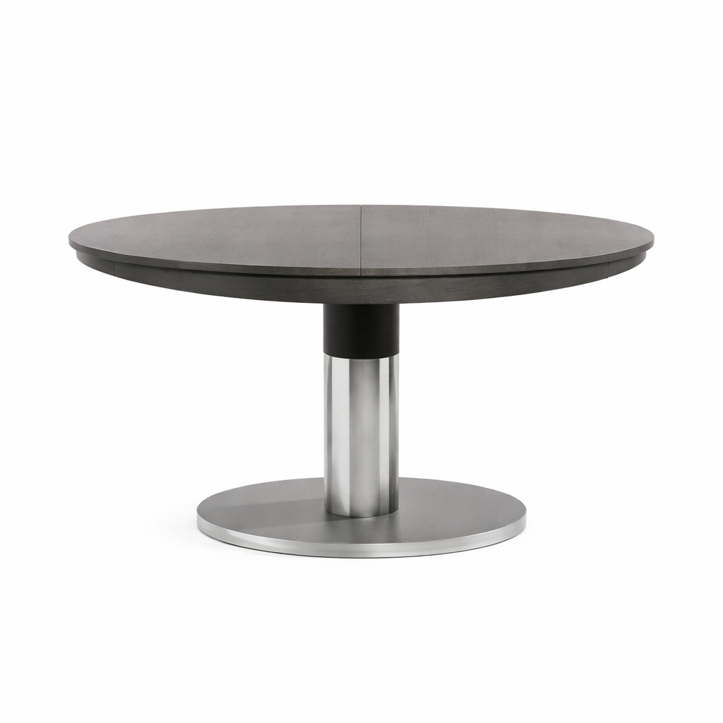 Oval dining table with dark gray top and silver metal base on a white background