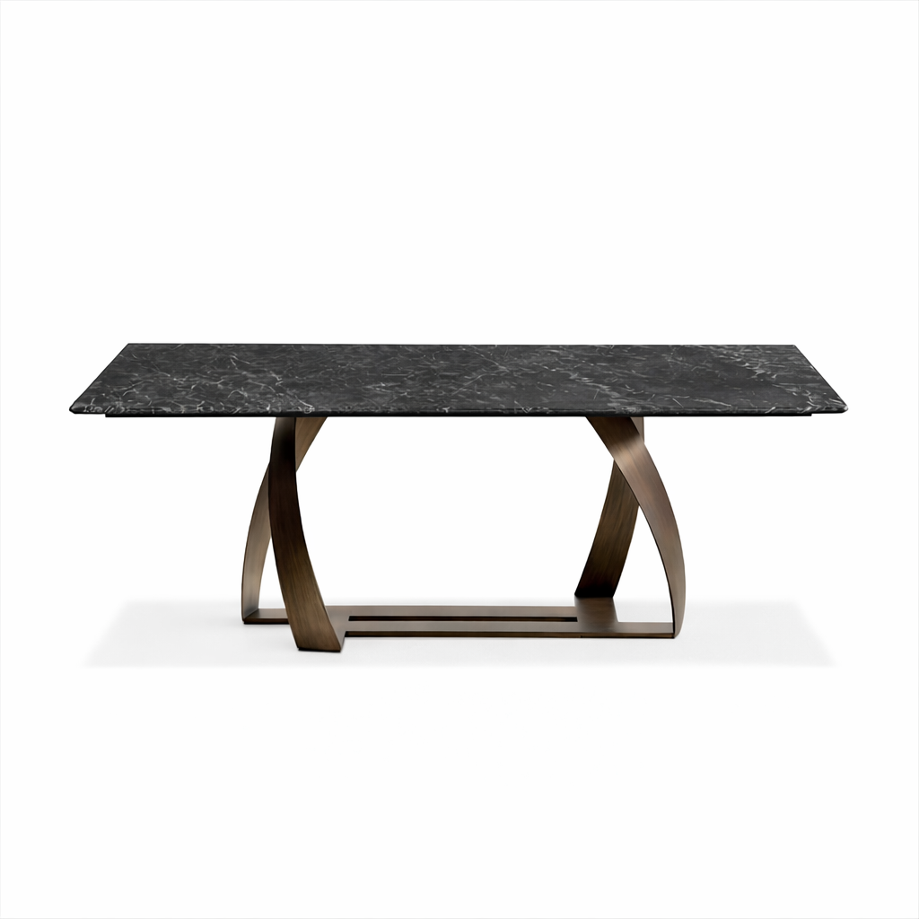 Marble-top table with bronze base on a white background