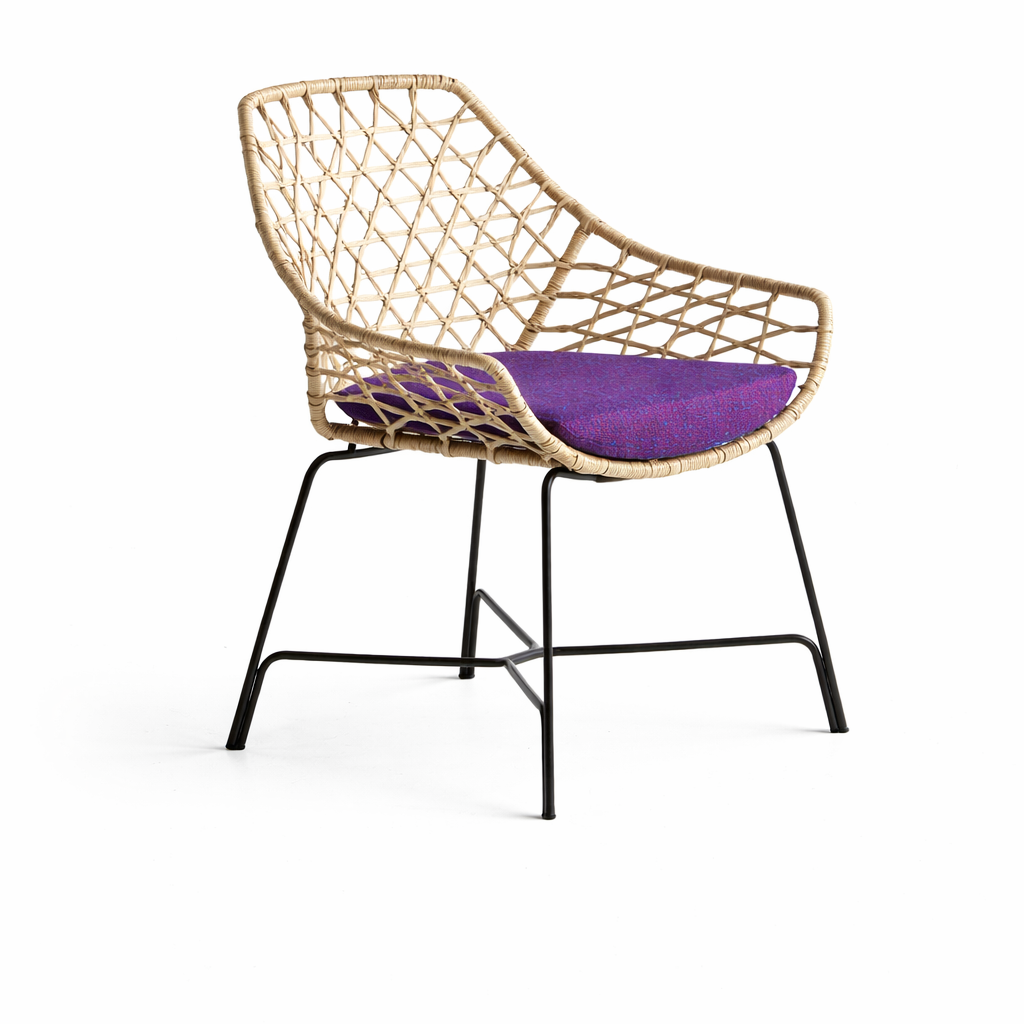 Woven chair with a purple cushion on a white background