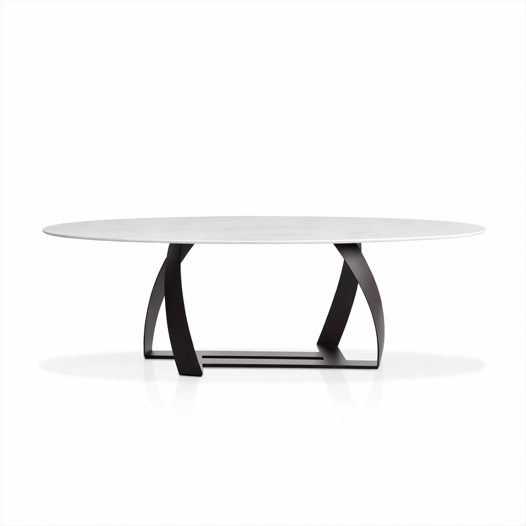 Modern coffee table with a white top and black metal base on a white background